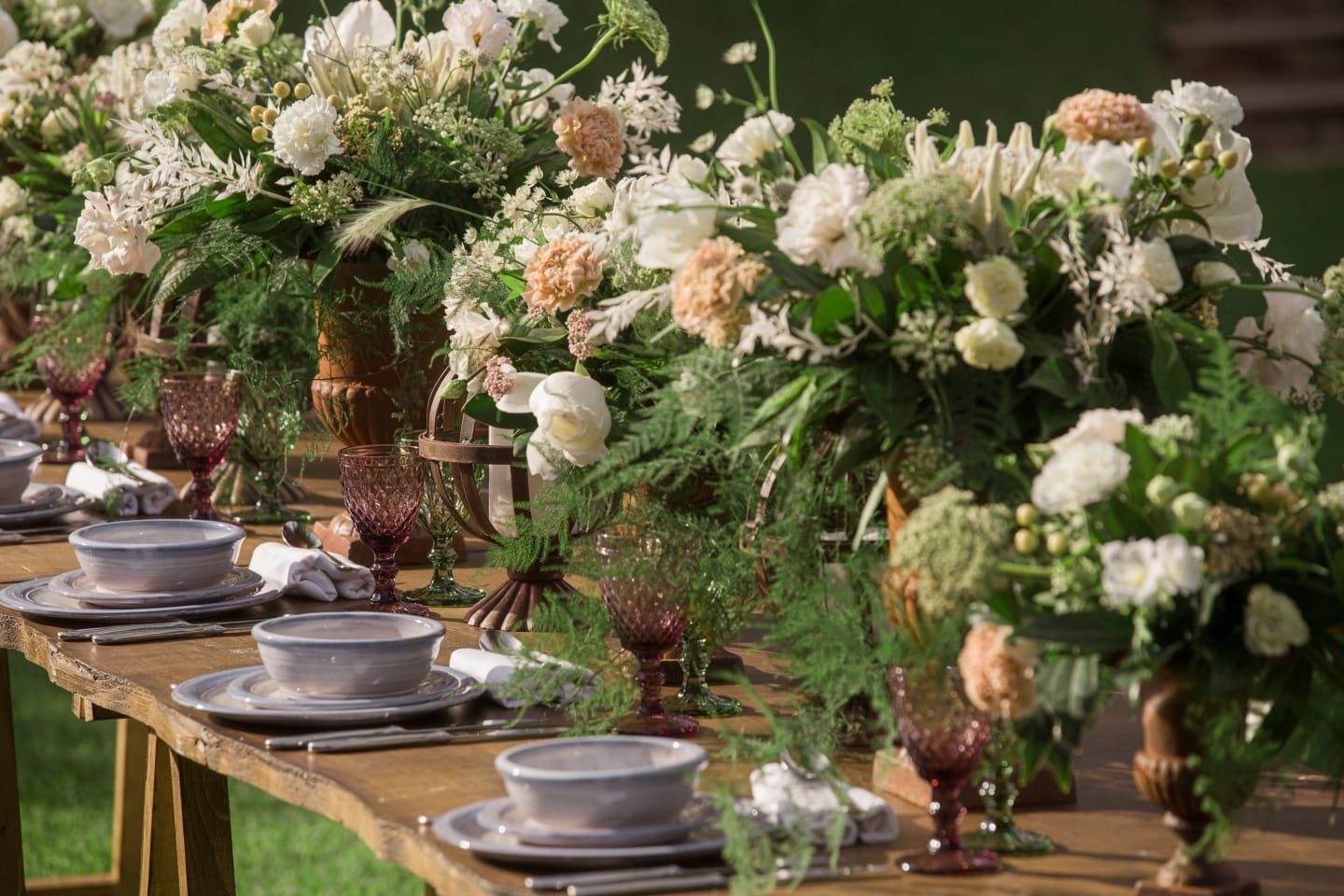 Autumn-toned floral tablescape in a private dining setting