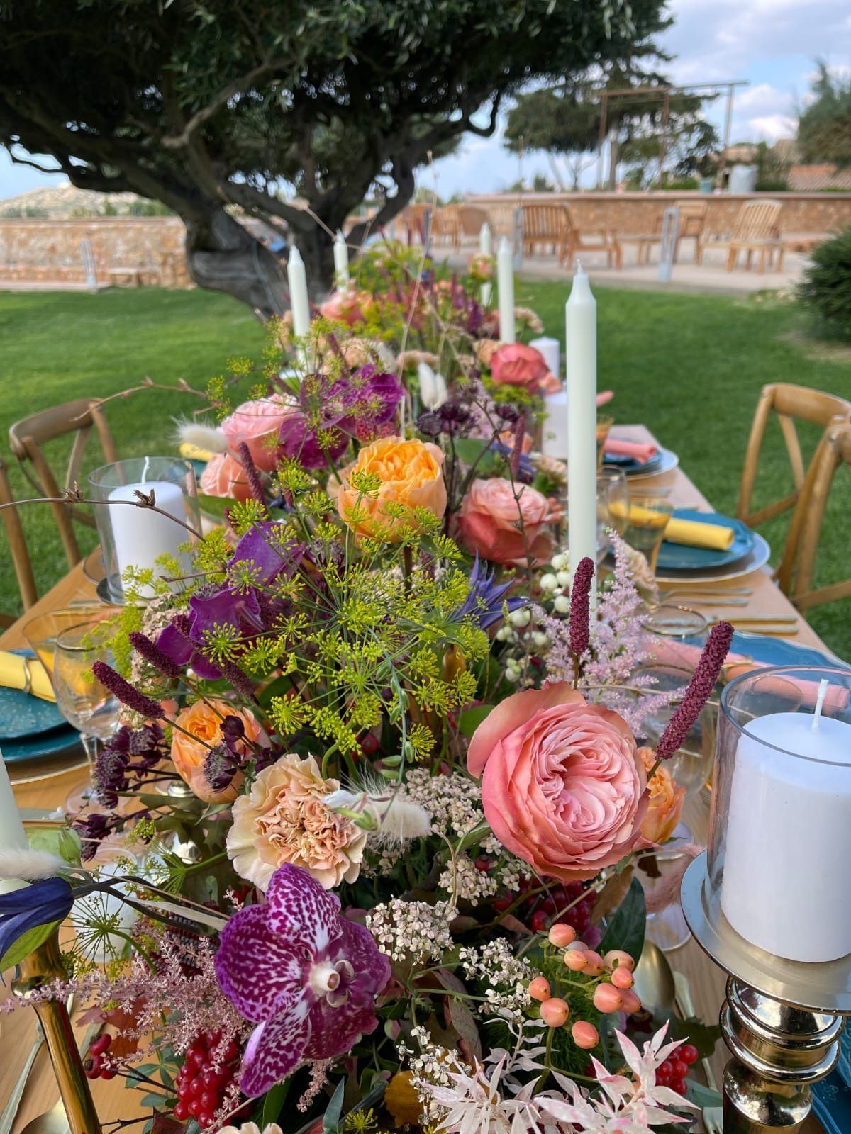 Long floral garland styled for a private villa dinner